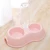 Import round plastic pet double bowl with water bottle eating a bowl of water with macarons color double dog bowl from China