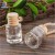 Import 10ml Eco-Friendly New Design Empty Glass Car Perfume Bottle Hanging with Wooden Cap Wholesale from China