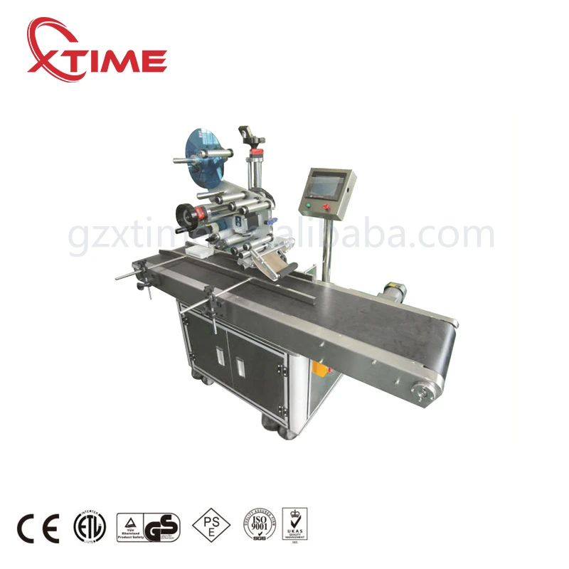 Alcoholic beverage bottle filling capping and labeling machine