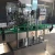 Import Automatic 12 Heads Plastic Bottle Beverage Juice Mineral Water Filling Machine Turkey from China