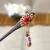 Import Chinese sandalwood women hair pins wooden hair sticks with crystal apparel and flowers designs from China
