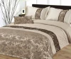 comforter/quilt with jacquard, stitching and elegant embs.