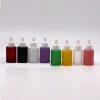 Convenient Customized flat shoulder 30ml glass dropper bottle 1 oz Pastel Cosmetic Bottles
