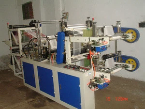 Double layers continuous winding plastic roll bag making machine