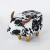 Import Eco-Friendly Comfortable low pouf nature beige fringe animal milkcow ottoman from China