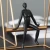 Import Factory Custom golden swing frame metal crafts wholesale black Miss character sculpture resin crafts for table top decoration from China
