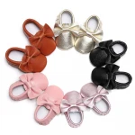 Factory wholesale Children's Stock Shoes Girls gold Leather Shoes Hard sole Children baby bow Moccasins