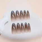 False nails wears a light brown removable nail patch with gradient short almond nail art