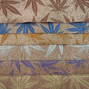 Maple leaf glitter leather is used for purse and bag faux leather