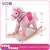 Import New baby children plush animal horse toys, custom adult spring rocking horse wood with wheels from China