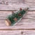 Import New Style Christmas Tree Desk Mini Decoration Snow Green Christmas Tree With Pine Cone Small Size from China