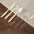 Import New style of heavy weight long handle disposable plastic PS spoons forks and knives from China