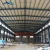 Import Steel roof truss structure prefab warehouse storage shed garage from China