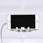 Wholesale Self-adhesive Plug Hoder Plastic Wall Mount Mobile Phone Holders