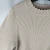 Import Womens new design rib knitted ruffled hem crew neck pullover sweater from China