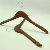 Flat style wooden hanger with notches on shoulder