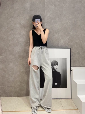 2021 spring and summer new solid color loose high waist ripped wide leg cut out organic cotton womens trousers & pants