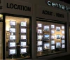 Cable Suspension LED light box for real estate agents window.