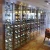 Import Customized Luxury Wine Storage 304 Stainless Steel Wall Mounted Wine Display Cabinet from China