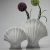 Import customized wholesale resin table small flower shell vase from China