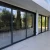 Import Exterior floor to ceiling windows patio balcony black low e double glazed laminated glass sliding door from China