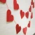 Import factory direct selling felt shapes wedding garland love heart curtain wedding supplies from China