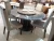 Import high quality good price big size  modern black round dinning table set used dining room furniture for sale from China
