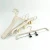 Import Hometime factory eco friendly pant hangers skirt hanger with adjustable rose gold clips from China