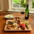 Import Wholesale Bamboo Cheese Board Set Charcuterie Platter with 4 Stainless Steel Tools, 2 Ceramic Trays from China