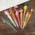 Import Wholesale Creative Wood Carving Animal Pen Stall Spots Hot Sale Craft Gift Neutral Pen from China
