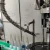 Import Automatic Single Head Glass Bottle Aluminium Cap Screw Capping Machine from China