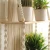 Import BOHO Woven Macrame Plant Hangerr with Double Wooden Shelf Wall Hanging Decor from China