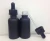Import Cylinder 30ml 50ml matte black frosted glass tincture bottle with bamboo dropper lid & tube box from China