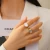Import Fashion Stainless Steel Plated 18K Gold Solid Gold Finger White Stone Stamp Ring from China
