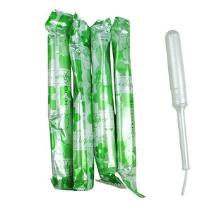 Feminine organic cotton tampons with plastic applicator