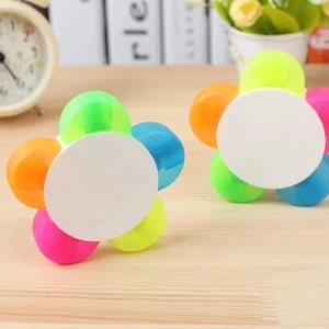 Flower-shaped frosted plastic case houses 5 neon highlighters all in one fun piece