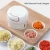 Import Hand-Held Meat Grinder Vegetable Twister Processor Multifunctional Multi-Function Mini Manual Food Chopper from China