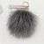 Import High Quality Raccoon fur ball Faux Fur Pom Poms Detachable With Snap On Button For Beanie Hats from China
