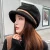 Import High quality winter cute warm plush curved brim women beret caps from China