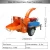 Import mobile wood crusher diesel branch garden shredder wood chipper machines from China