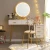 Import Nordic With cabinet dressing table with mirror and stool Dressing table with 3 light effect LED mirrors Golden Iron Dresser from China
