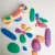 Import Rainbow Pebble wooden stones childrens toys educational creativity imagination training balance bricks from China