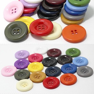 Resin button wholesale thickening four - eye large round button coat trench coat button 15-30MM