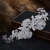 Import SG0134 New luxury silver bridal tiara flower rhinestone hair accessories wedding hair clip on sale from China