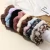 Import Winter girl furry leopard pattern Pom Pom elastic hair ties accessories women wholesale colorful faux fur hair scrunchies from China