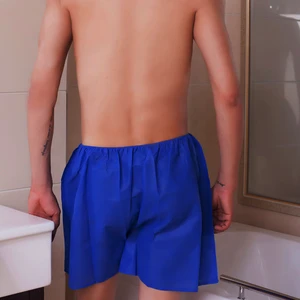 Woodpulp spunlace sauna underwear bath towel hotel disposable non woven pants shorts