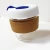 Import glass coffee cup keep cup with silicone lid and cork from China