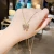 Import Amazon Hot Butterfly Purple Necklace Delicate Zircon Stainless Steel Necklace Pendant Necklace For Woman from China
