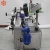 Import Auto vertical automatic round bottle liquid cap cans container wrap labeling machine from China
