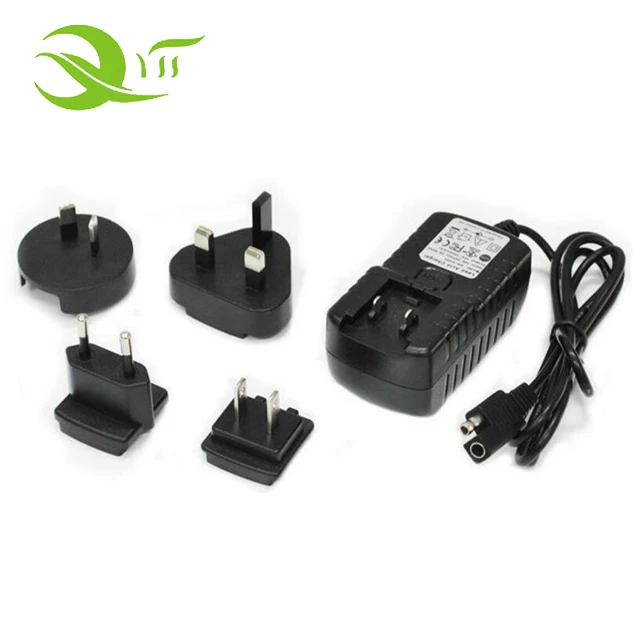 CE FCC Rohs listed Travel Adapter UK US EU AU 12V 24V 1A 1.5A Interchangeable Plugs Power Adapter For Global market